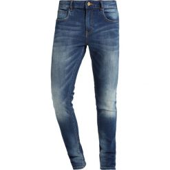 Scotch & Soda SKIM Jeans Skinny Fit kimono yes. Niebieskie rurki męskie Scotch & Soda, z bawełny. W wyprzedaży za 377,10 zł.