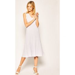 Sukienka dzianinowa MICHAEL Michael Kors MS98YMMBFD. Niebieskie sukienki damskie MICHAEL Michael Kors, xs, bez wzorów, z elastanu, bez kołnierzyka, bez rękawów. Za 1119,00 zł.