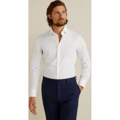 Mango Man - Koszula Emeritol. Niebieskie koszule męskie Mango Man, s, bez wzorów, z elastanu, eleganckie, z włoskim kołnierzykiem, z długim rękawem. W wyprzedaży za 119,90 zł.