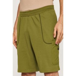 Adidas Originals - Szorty. Zielone spodenki sportowe męskie adidas Originals, s, bez wzorów, z bawełny, sportowe. Za 179,90 zł.