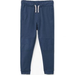 Mango Kids - Spodnie dziecięce Rick 110-164 cm. Szare spodnie chłopięce marki Mango Kids, z bawełny. W wyprzedaży za 49,90 zł.