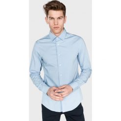 G-Star RAW Core Koszula Niebieski. Niebieskie koszule męskie G-Star RAW, s, bez wzorów, z elastanu, retro, bez kołnierzyka, z długim rękawem. Za 352,95 zł.