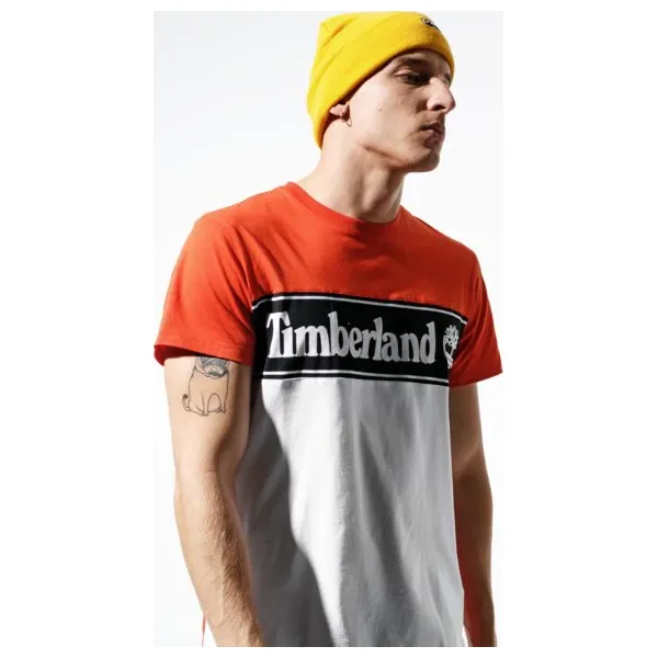 Timberland Koszulka Ss Ss Cut & Sew Linear Logo Tee , pomaranczowy, rozmiar M. Pomarańczowe koszulki męskie Timberland, m, z nadrukiem, z bawełny, z kontrastowym kołnierzykiem, z krótkim rękawem, krótkie. Za 129,99 zł.