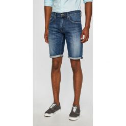 Tommy Jeans - Szorty. Niebieskie spodenki i szorty męskie Tommy Jeans, bez wzorów, z elastanu, casualowe. Za 299,90 zł.
