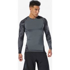 Reebok Classic Koszulka Czarny. Czarne podkoszulki męskie Reebok Classic, m, bez wzorów, z elastanu, bez kołnierzyka, z długim rękawem, długie. Za 254,95 zł.