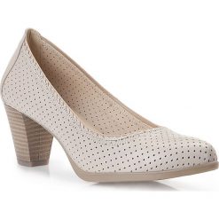 Buty damskie. Niebieskie czółenka damskie Wittchen, na co dzień, bez wzorów, ze skóry, na niskim obcasie, na słupku. W wyprzedaży za 279,90 zł.
