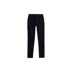 Spodnie damskie legginsy, gładkie. Czarne legginsy damskie marki TXM. Za 23,99 zł.