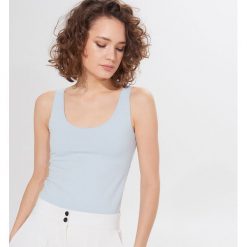 Bawełniany top Eco Aware - Niebieski. Niebieskie topy damskie Mohito, s, bez wzorów, z bawełny, bez kołnierzyka. Za 39,99 zł.