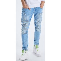 Jeansy slim - Niebieski. Niebieskie jeansy męskie Cropp, m, bez wzorów. W wyprzedaży za 119,99 zł.