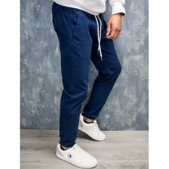 Spodnie męskie joggery na gumce granatowe Recea. Spodnie męskie Recea, s, bez wzorów, z bawełny. Za 99,99 zł.