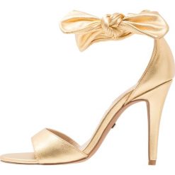 Sandały damskie: Buffalo Sandały na obcasie metallic gold