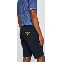 Scotch & Soda - Szorty. Białe spodenki i szorty męskie marki Scotch & Soda, bez wzorów, z bawełny, casualowe. Za 299,90 zł.