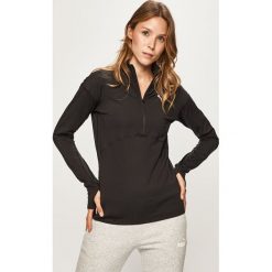 Puma - Bluza. Czarne bluzy damskie Puma, s, bez wzorów, z elastanu, z krótkim rękawem, krótkie, bez kaptura. W wyprzedaży za 179,90 zł.