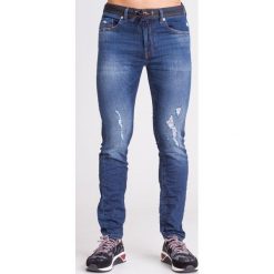 JOGGJEANS THOMMER CB-NE CARROT FIT DIESEL. Szare jeansy męskie Diesel, m, z aplikacjami, z obniżonym stanem. Za 539,50 zł.