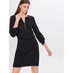 Sukienka z lyocellem Tencel™ Eco Aware - Czarny. Czarne sukienki damskie Mohito, s, z lyocellu. Za 99,99 zł.
