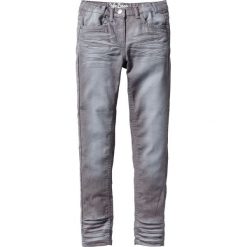 Spodnie SKINNY "used" bonprix dymny szary. Szare rurki dziewczęce bonprix. Za 49,99 zł.