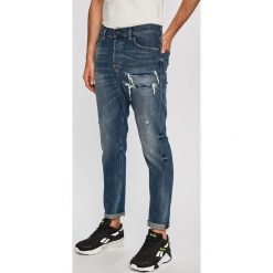 Diesel - Jeansy D-Vider. Niebieskie jeansy męskie Diesel, bez wzorów. W wyprzedaży za 399,90 zł.