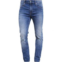 Cheap Monday Jeansy Slim Fit serene blue. Niebieskie jeansy męskie relaxed fit marki Cheap Monday. Za 249,00 zł.