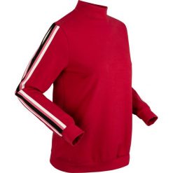 Bluza z wycięciami z kolekcji Maite Kelly, długi rękaw bonprix pomarańczowo-czerwony. Czerwone bluzy damskie bonprix, bez wzorów, z długim rękawem, długie, bez kaptura. Za 89,99 zł.