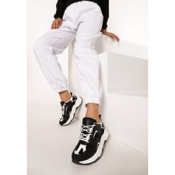 Czarne Sneakersy Achilia. Czarne sneakersy damskie Born2be, z dresówki. Za 109,99 zł.