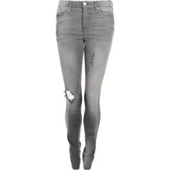 Diesel Jeansy "Skinzee". Jeansy damskie Diesel, bez wzorów, z jeansu. Za 399,00 zł.