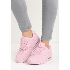 Różowe Buty Sportowe Classic Nilda. Czerwone buty sportowe damskie marki KALENJI, z gumy. Za 89,99 zł.