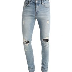 AllSaints ICHNAW CIGARETTE Jeans Skinny Fit indigo. Niebieskie jeansy męskie marki AllSaints, m, bez wzorów. Za 569,00 zł.