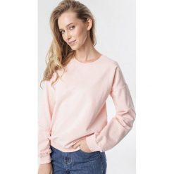 Jasnoróżowa Bluza Rachael. Różowe bluzy damskie Born2be, xl, bez wzorów, z dzianiny, z długim rękawem, długie, bez kaptura. Za 69,99 zł.