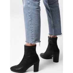 Czarne Botki West Jasmine. Czarne botki damskie Born2be, na jesień, klasyczne, za kostkę, na wysokim obcasie, na słupku, bez zapięcia. Za 99,99 zł.