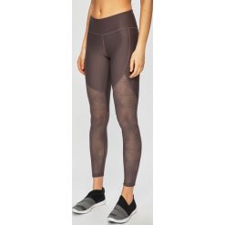 Under Armour - Legginsy. Fioletowe spodnie damskie Under Armour, s, z elastanu. W wyprzedaży za 159,90 zł.