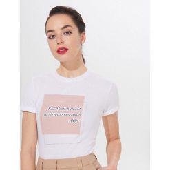 Koszulka z modalem - Biały. Białe koszulki damskie Mohito, s, bez wzorów, bez kołnierzyka, bez rękawów. Za 59,99 zł.