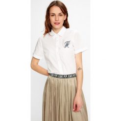 Tommy Hilfiger - Koszula Hadley. Szare koszule damskie TOMMY HILFIGER, z bawełny, casualowe, z klasycznym kołnierzykiem, z krótkim rękawem. W wyprzedaży za 239,90 zł.