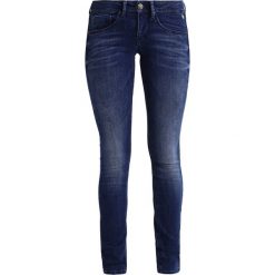 Freeman T. Porter CLARA Jeansy Slim fit flexy indigo. Niebieskie rurki damskie Freeman T. Porter. W wyprzedaży za 246,35 zł.