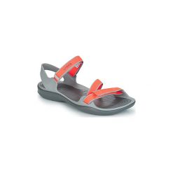 Sandały Crocs SWIFTWATER WEBBING SANDAL W. Różowe klapki damskie Crocs, bez wzorów, bez obcasa. Za 199,00 zł.