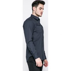 G-Star Raw - Koszula. Niebieskie koszule męskie G-Star RAW, s, bez wzorów, z bawełny, klasyczne, z klasycznym kołnierzykiem, z długim rękawem. W wyprzedaży za 269,90 zł.