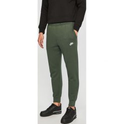 Nike Sportswear - Spodnie. Niebieskie spodnie męskie Nike Sportswear, na co dzień, m, bez wzorów, z bawełny, casualowe. Za 159,90 zł.