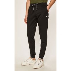 Reebok - Spodnie. Czarne spodnie męskie Reebok, s, z poliesteru, sportowe. Za 179,90 zł.