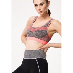 Pomarańczowy Biustonosz Sportowy Milreis. Pomarańczowe biustonosze sportowe damskie Born2be, xl, bez wzorów. Za 29,99 zł.