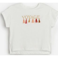 Bawełniany t-shirt z chwostami -. T-shirty damskie Reserved, bez wzorów, z bawełny, bez kołnierzyka. Za 35,99 zł.