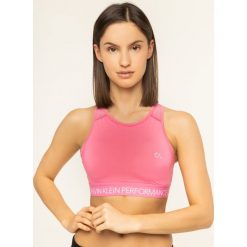 Biustonosz top Calvin Klein Performance Medium Support Bra 00GWF9K188. Różowe topy damskie Calvin Klein Performance, m, bez wzorów, z elastanu, bez kołnierzyka. W wyprzedaży za 139,00 zł.