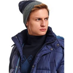 Czapka męska. Niebieskie czapki męskie na zimę, z materiału. W wyprzedaży za 19,99 zł.