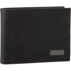 Duży Portfel Męski GUESS - Trevis Slg SMTREV LEA38 BLA. Czarne portfele męskie Guess, z aplikacjami, ze skóry. Za 289,00 zł.
