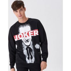 Bluza z nadrukiem The Joker - Czarny. Czarne bluzy męskie House, s, z nadrukiem, bez kołnierzyka, bez rękawów, bez kaptura. Za 99,99 zł.