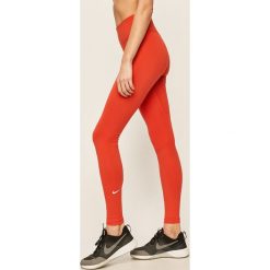 Nike - Legginsy. Czerwone spodnie damskie Nike, s, bez wzorów, z elastanu. Za 169,90 zł.