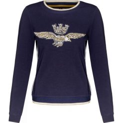 Bluza AERONAUTICA MILITARE. Niebieskie bluzy damskie Aeronautica Militare, z nadrukiem, z bawełny, bez rękawów, bez kaptura. W wyprzedaży za 432,00 zł.