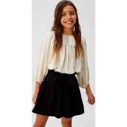 Mango Kids - Spódnica dziecięca Kore 110-164 cm. Czarne spódniczki dziewczęce Mango Kids, bez wzorów, z bawełny, mini, rozkloszowane. Za 89,90 zł.