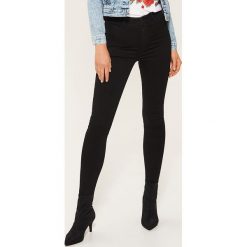 Jeansy high waist skinny - Czarny. Czarne jeansy damskie skinny marki House, z jeansu, z podwyższonym stanem. Za 79,99 zł.