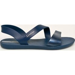 Ipanema - Sandały. Żółte klapki damskie Ipanema, bez wzorów, z gumy, bez obcasa, na obcasie. W wyprzedaży za 99,90 zł.