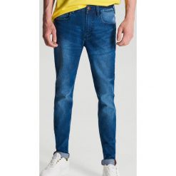 Jeansy skinny - Granatowy. Niebieskie jeansy męskie Cropp, m, bez wzorów. Za 119,99 zł.