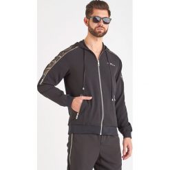 BLUZA MILAR john richmond. Bluzy męskie John Richmond, m, bez wzorów, bez kołnierzyka, bez rękawów, bez kaptura. W wyprzedaży za 751,20 zł.